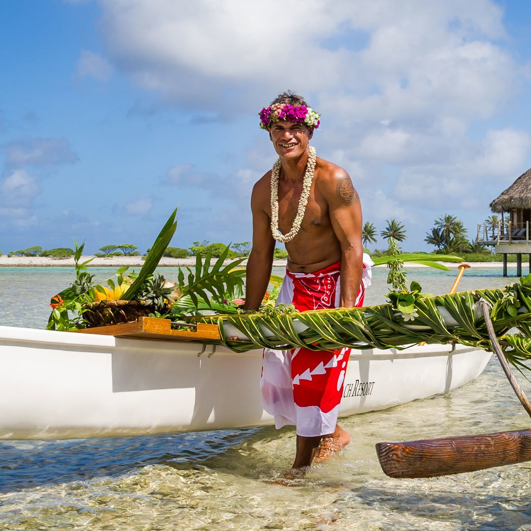 enjoy a canoe breakfast near your over the water bungalow in Tahiti